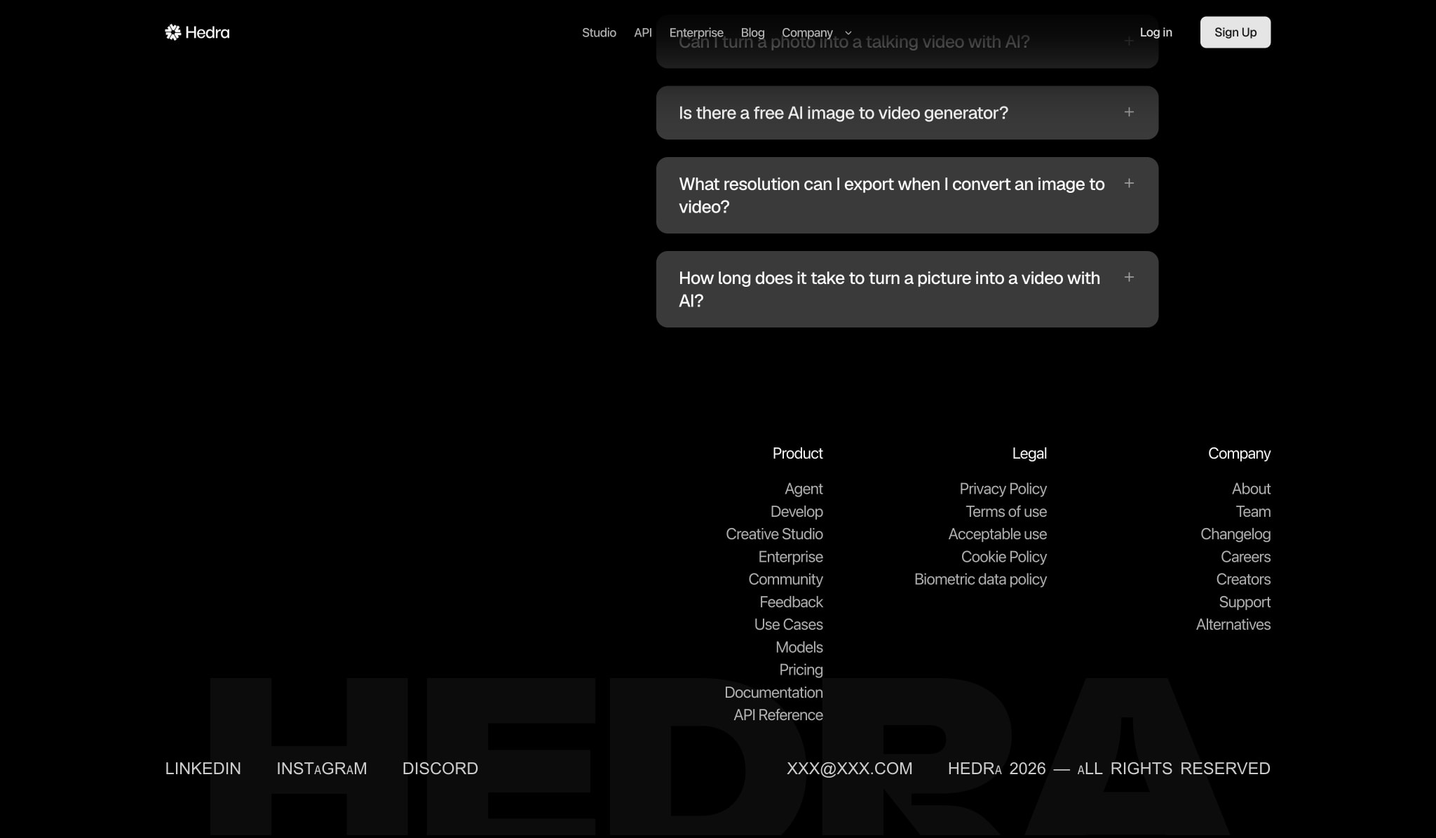 Dark FAQ accordion section with footer navigation and large background wordmark on black canvas captured website design