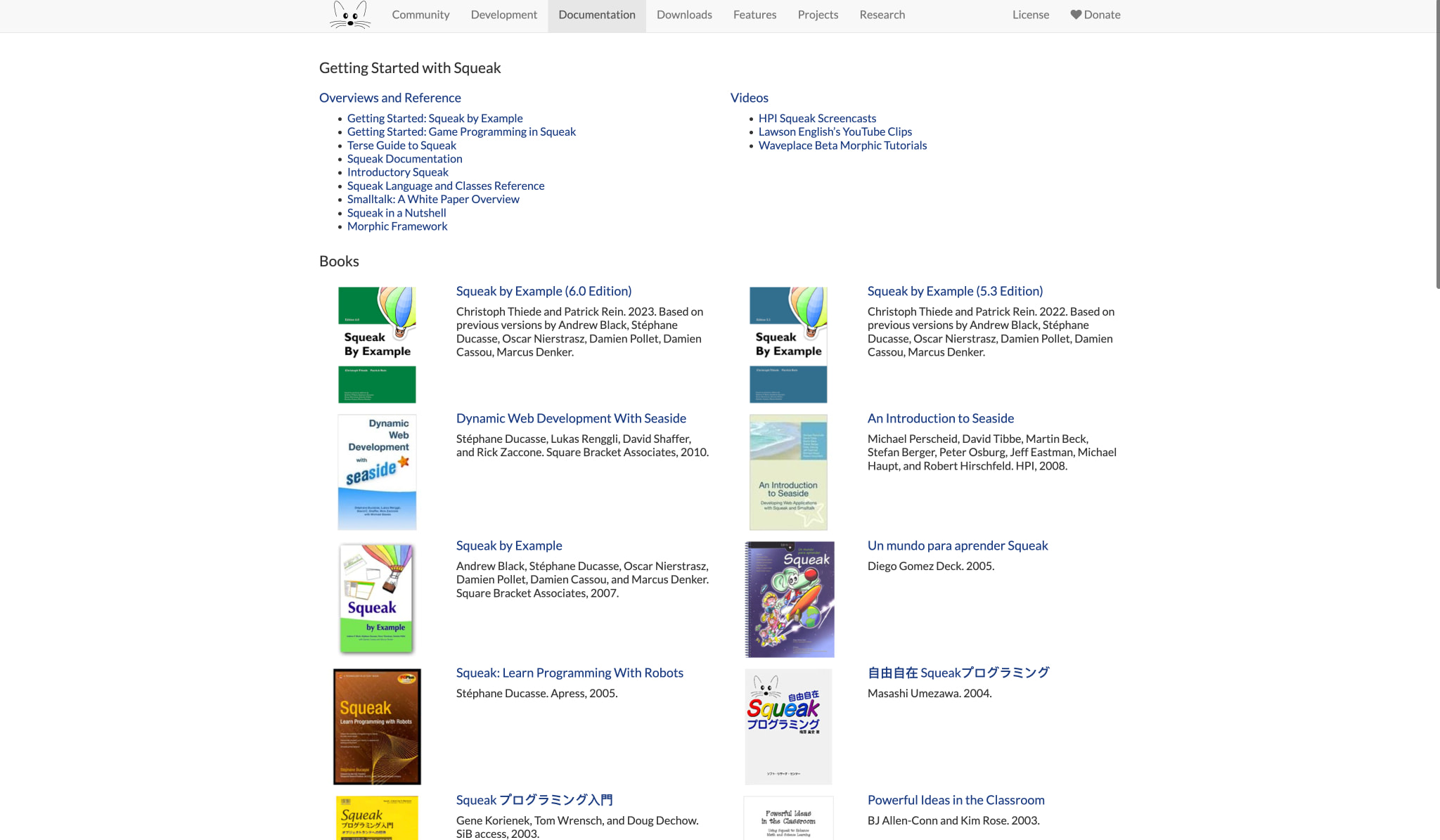 Documentation page with book covers grid, video links, and Getting Started resources captured website design