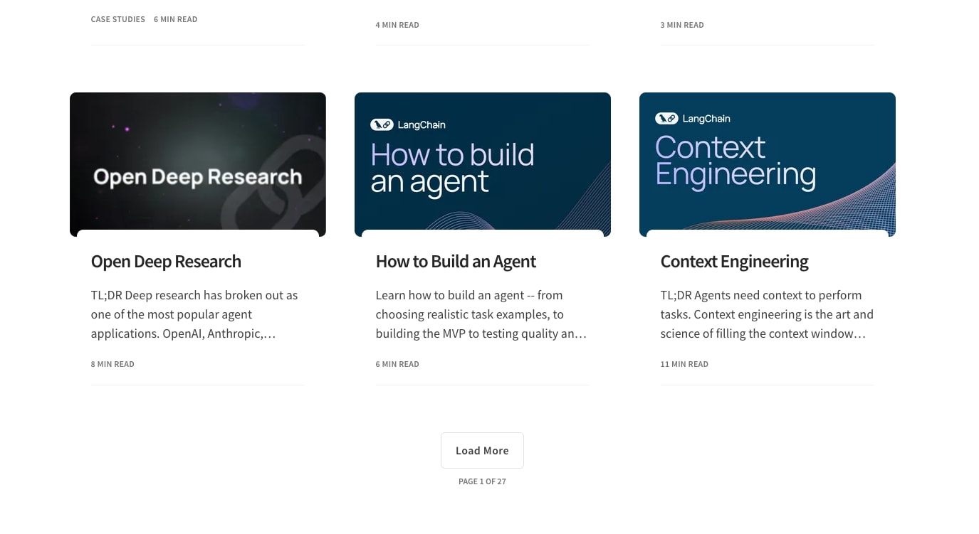 Blog index showing three article cards with dark gradient thumbnails, category labels, and a centered Load More button on white canvas captured website design