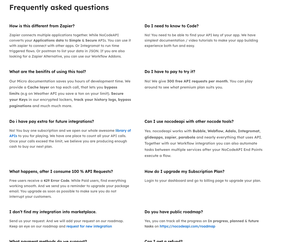 Two-column FAQ grid with bold questions and restrained gray answer copy captured website design