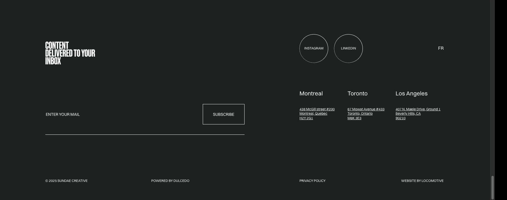 Dark footer with email subscription, social circles, and three-column city addresses on near-black background captured website design