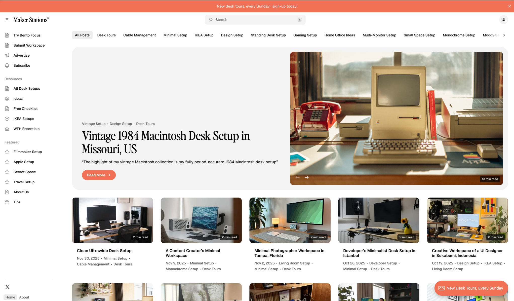 Homepage hero section with coral banner, navigation sidebar, featured vintage Macintosh article card, and grid of workspace thumbnails with rounded corners and read-time badges captured website design