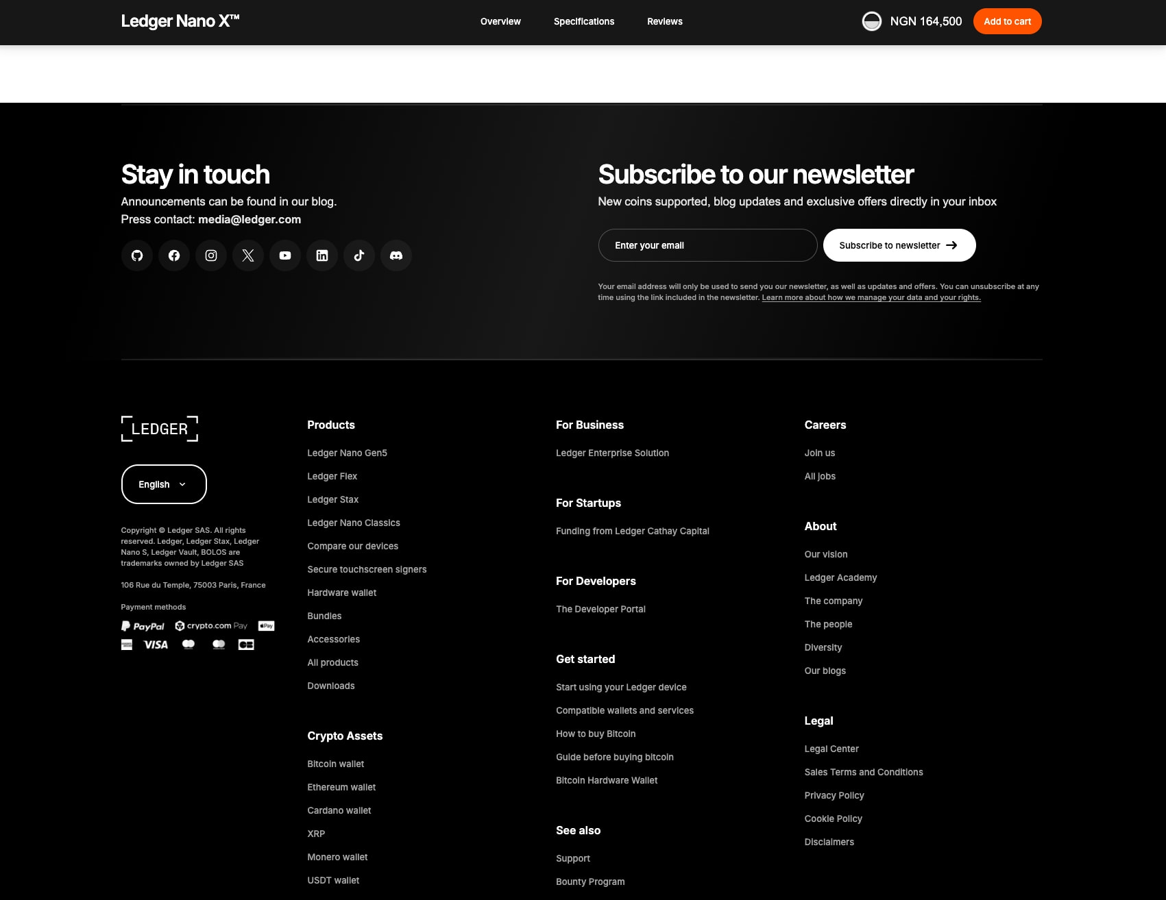 Dark footer with newsletter subscription, social icons, and multi-column link navigation on black background captured website design